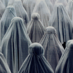 image showing group of people in white shrouds