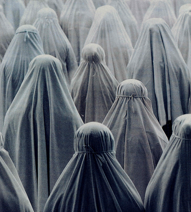 image showing group of people in white shrouds